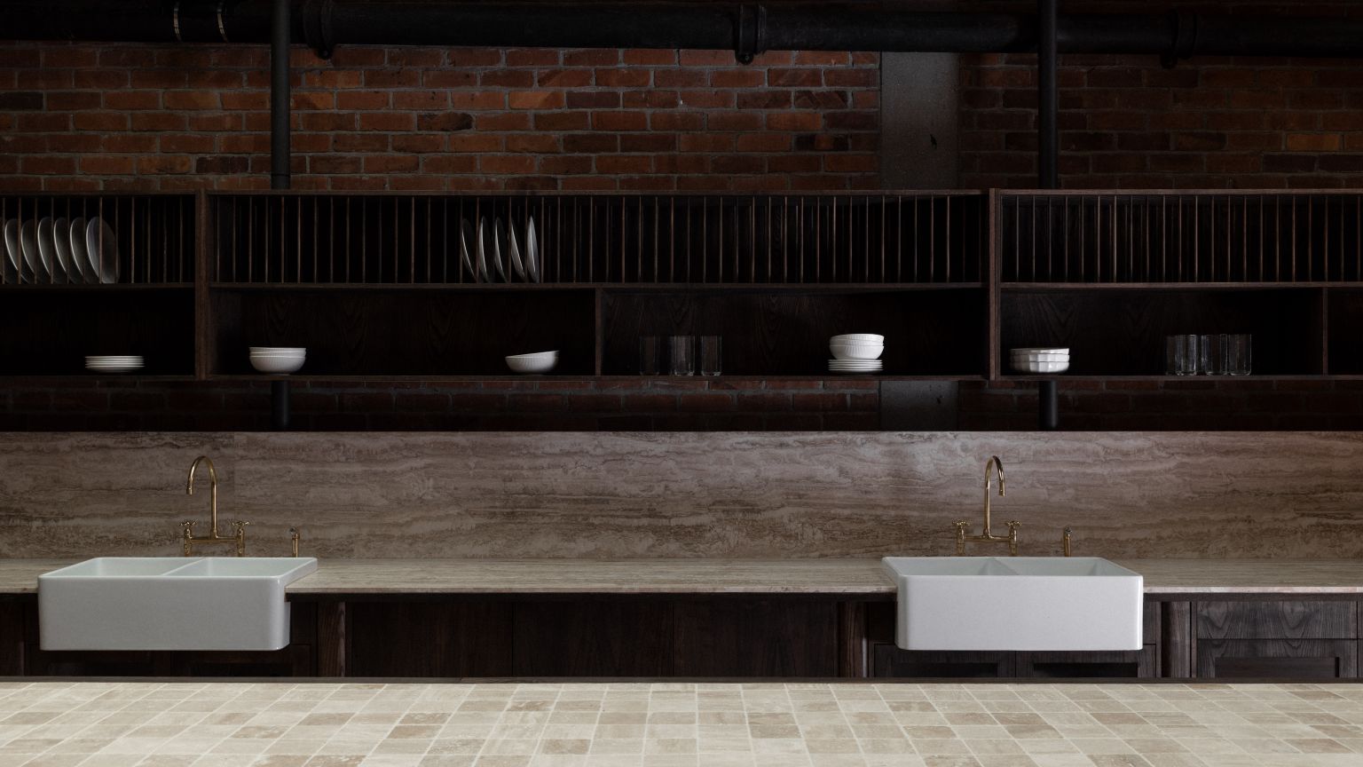 Professional dual farmhouse sink plumbing and tapware installation for a residential or commercial kitchen project completed by licensed plumbers in Howick, Auckland.