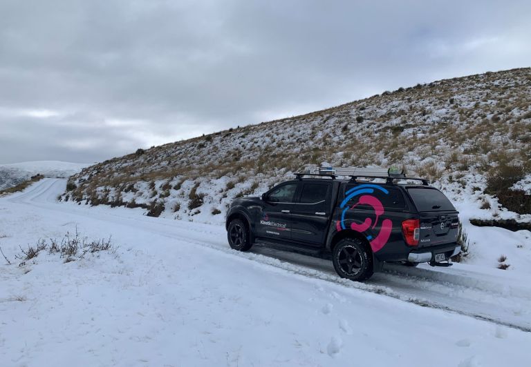 Kinetic Electrical Queenstown Vehicle on Snowy Mountain