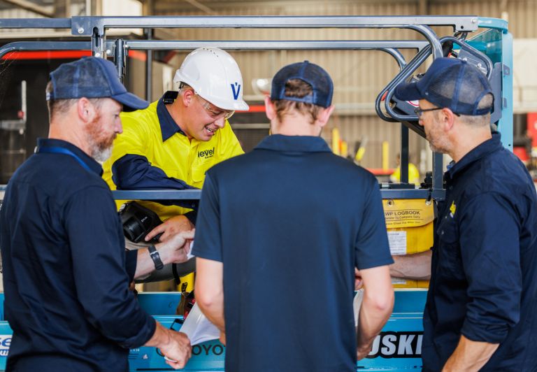 Level Electrical team members working together on-site, showcasing the collaboration and expertise behind Level’s electrical and plumbing services in New Zealand