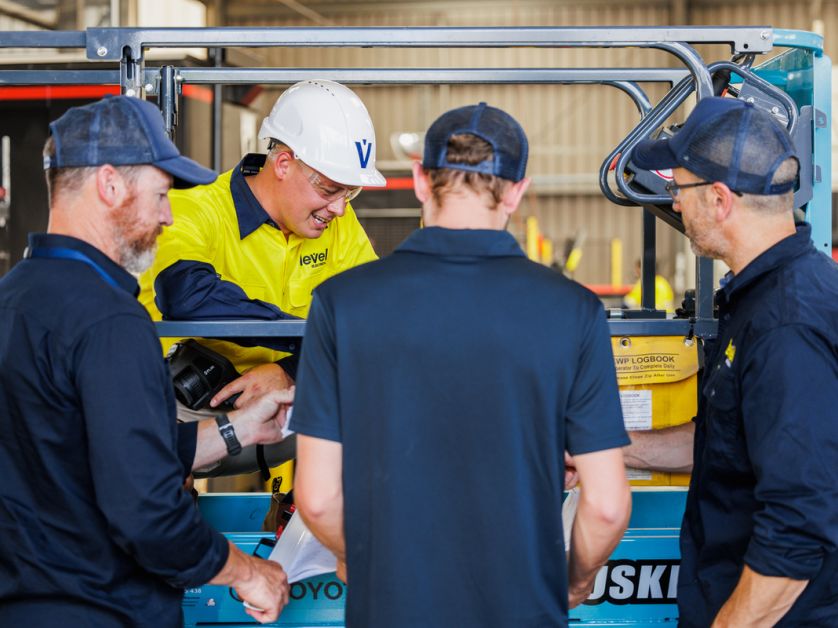 Level Electrical team members working together on-site, showcasing the collaboration and expertise behind Level’s electrical and plumbing services in New Zealand